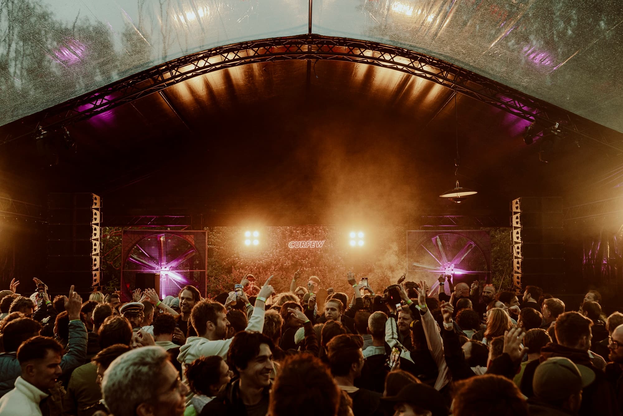 DJ duo performing in blue lights at Curfew